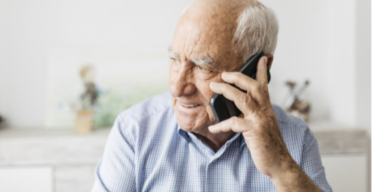 Picture: Man on cell phone looking to his right